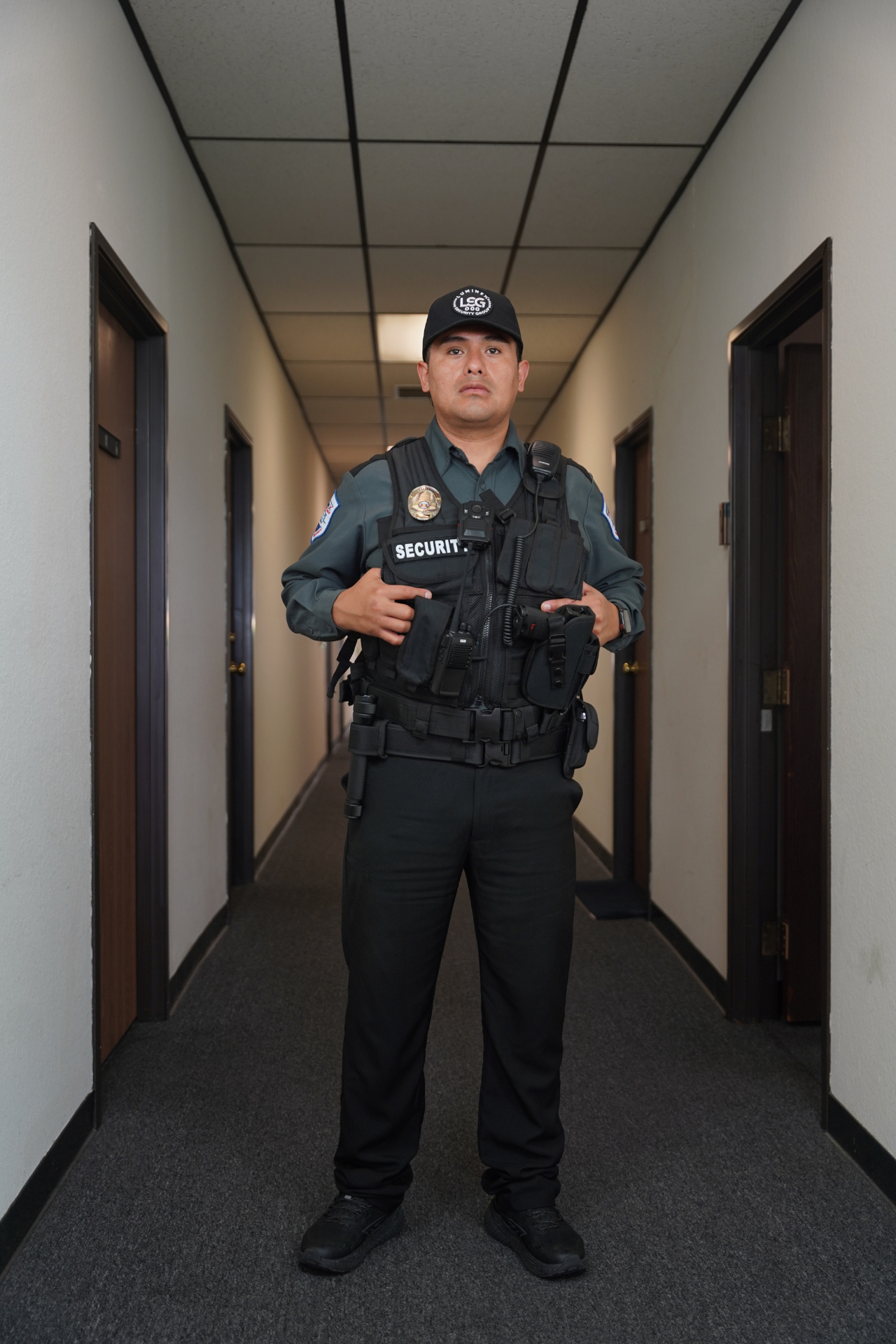 Luminex tactical officer full length in interior corridor on patrol post